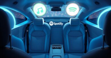 Futurystyczne wnętrze autonomicznej taksówki Waymo z Spotify: subtelne światło, muzyka, playlisty.